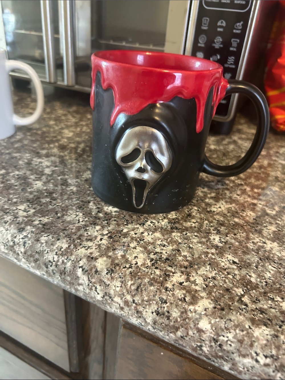 Spooky Ceramic Mug in Black and Red — Horror Face Design